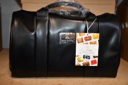 An as new Nova Harley Manhattan blackberry leather changing bag.