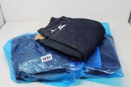 Three pairs of as new Acne Studios jeans (W25/L30, W26/L34, W30/L30).