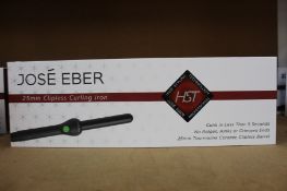 A boxed as new Jose' Eber HST 25mm Clipless Curling Iron (Some minor damage to packaging).