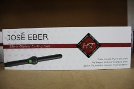 A boxed as new Jose' Eber HST 25mm Clipless Curling Iron.
