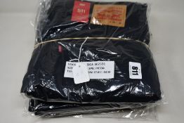 Four pairs of as new Levi's 511 slim jeans (W34/L32).