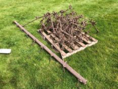 Chain harrows with bar