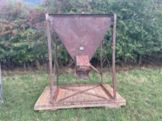 Metal feed bin on stand