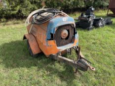 Hydrovane trailed compressor with 4 cylinder Ford diesel engine, single axle