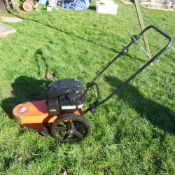 Pedestrian strimmer with Briggs and Stratton 675 EX1 series petrol engine