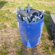 Drum of electric fencing wire and stakes