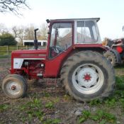 International 574 Tractor, first registered 18.9.1972, registration AFJ 335L. No VAT on this lot.