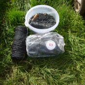 Bucket of net hooks and 2 rolls of net wire