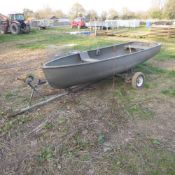 10ft x 4ft Rowing boat with oars and trailer. No VAT on this lot.