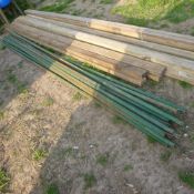 Sundry wooden rails and 13 x square steel lengths 12 x 12ft and 1 x 9ft