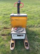 Electric pallet truck and battery charger