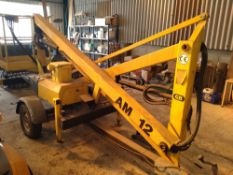 AM12 electric cherry picker - 12m Reach c/w transformer, a tyre requires replacing.