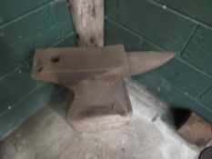 Anvil on wooden block