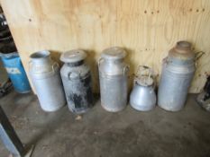 Assorted vintage milk churns