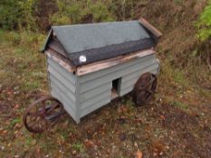 Chicken hut on 3 cast iron wheels