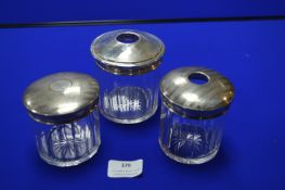 Three Cut Crystal Jars with Hallmarked Sterling Silver Lids
