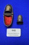 Two Hallmarked Sterling Silver Thimbles and a Thimble Case