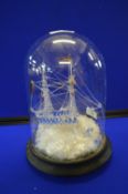 Glass Model of a Sailing Ship under a Glass Dome
