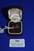 Hallmarked Sterling Silver Ring with Garnet