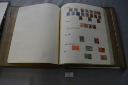 Twin Lock Ledger Album Containing Worldwide Stamps