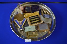 Vintage Collectibles; Compacts, Lighters, Lipsticks, and a Car Badge