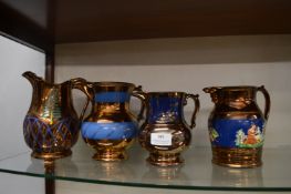 Four Victorian Copper Lustre Jugs