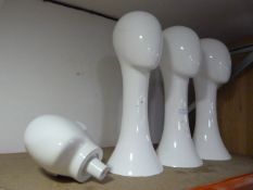 *Three Display Heads and a Mannequin Head