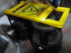 *Two Kick Stools and a Wet Floor Sign