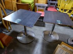 * 2 x square tables with pedestal bases dark tops