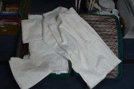 Suitcase of Tablecloths