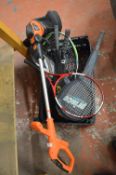 *Box of Tennis Rackets and a Strimmer