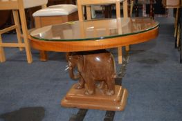 Teak Glass Topped Oval Coffee Table with Elephant