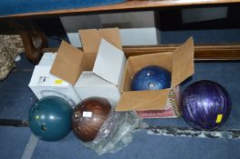Three Columbia and One Power Ball Bowling Balls
