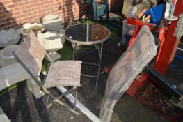 Circular Garden Table and Two Folding Chairs