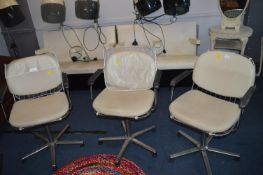 Three Vintage Chrome Salon Swivel Chairs