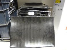 *Fifteen Small Black Trays