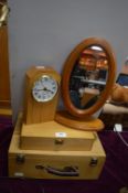 Two Wooden Boxes, a Mirror, and a Clock