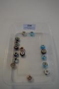 Sixteen Murano Glass Charm Beans (most have 925 si