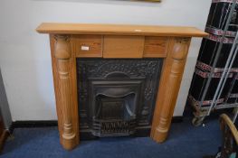 Reproduction Cast Iron Fireplace with Pine Surroun