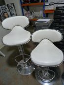 *2 White Gas-Lift Chairs