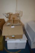 *Box of Wine Glasses and a Box of Olympia Margaret