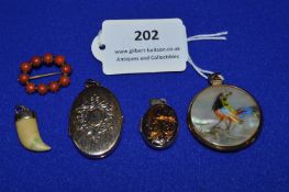 Five 9k Gold Lockets, Brooches, and Pendants