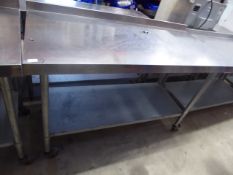 * Vogue S/S prep brench with upstand to rear and undershelf on castors. 1500w x 700d x 1050h