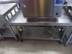* S/S table - low level with upstand to rear and undershelf. 1200w x 600d x 750h
