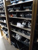 *9 Shelves of Stainless Steel Components; Machine