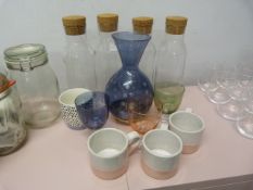 *Four Storage Bottles, Cups, and Glasses