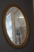 Oval Gilt Framed Beveled Edge Mirror