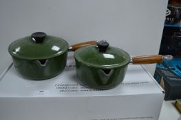 Two Green Le Creuset Pans