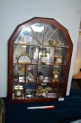 Twelve Miniature Clocks in Wall Display Cabinet
