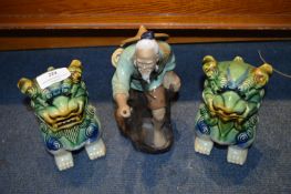 Two Chinese Lions and an Old Gentleman